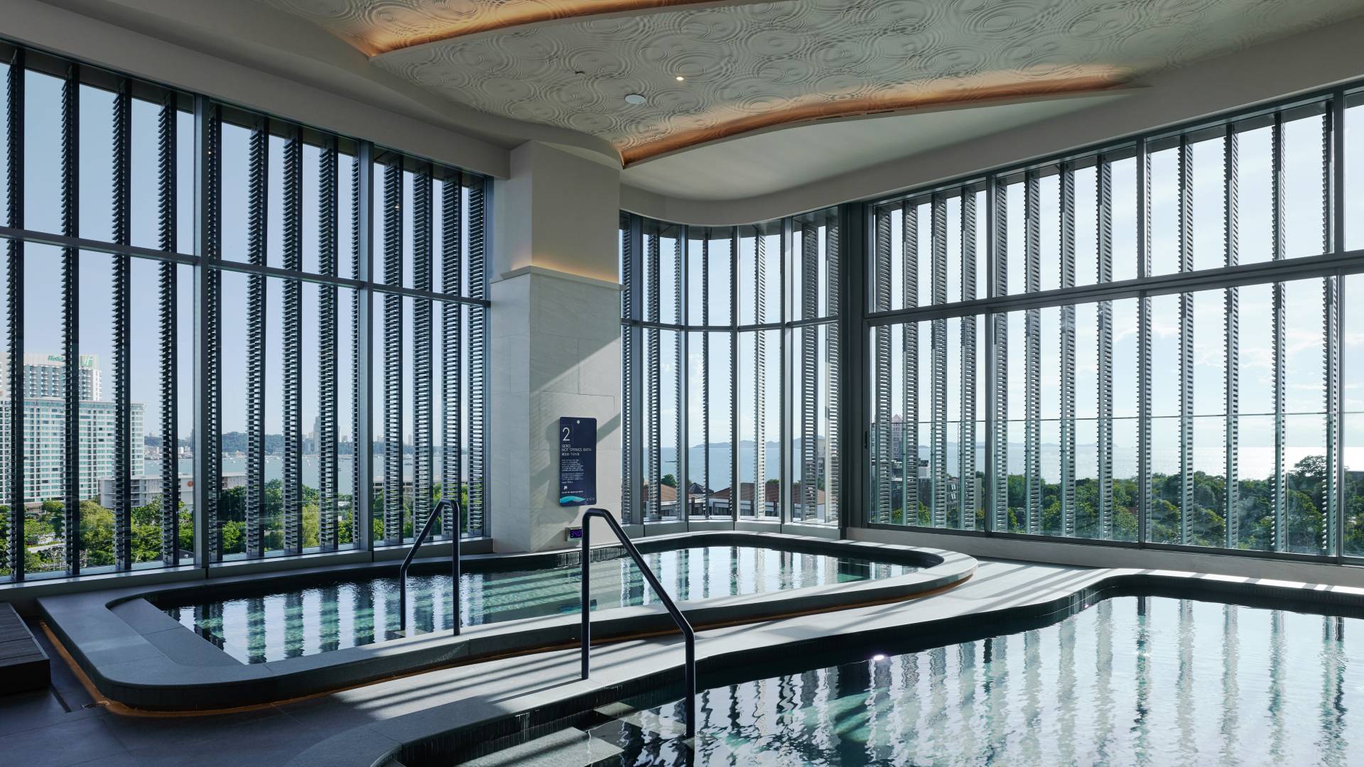 Let’s Relax Onsen and Spa Pattaya with indoor hot spring pools and sea views
